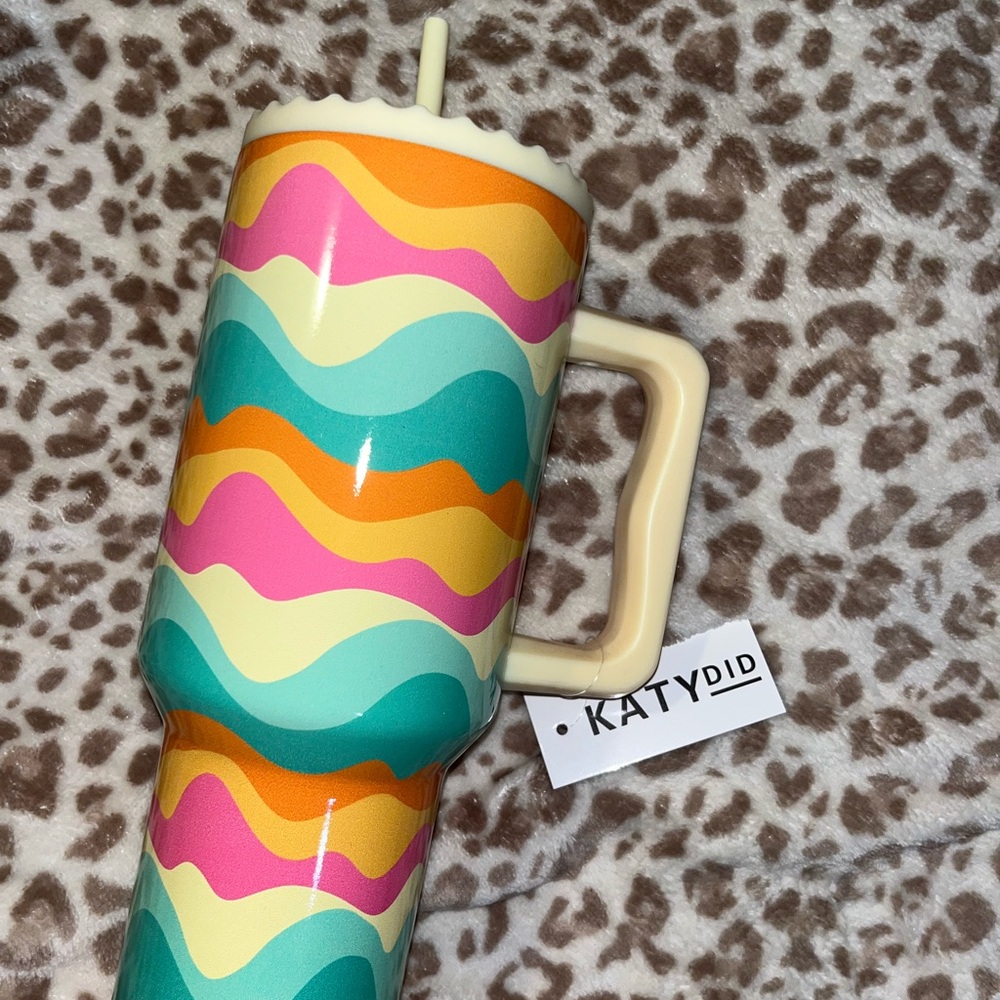 Katydid Cream Handle Travel Tumbler with Teal, Pink and Orange Waves